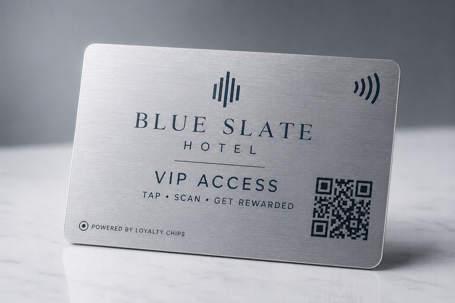 Blue Slate Hotel brushed-metal VIP card with laser-etched venue branding and NFC mark.