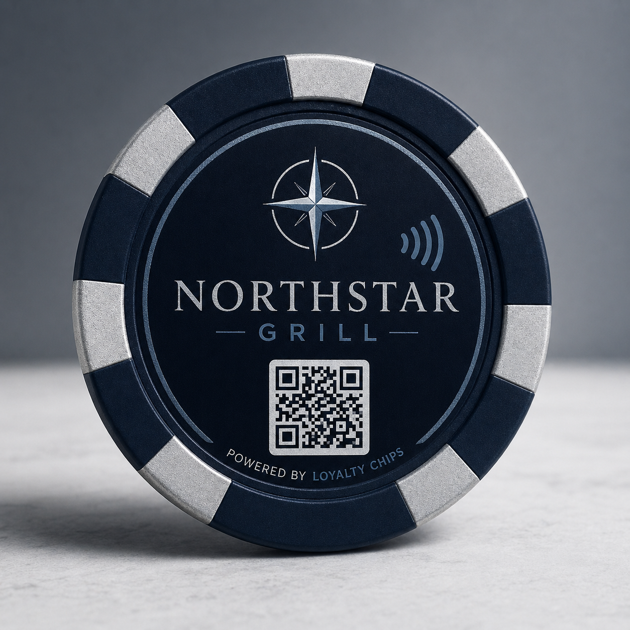 Northstar Grill navy and silver weighted 39mm poker chip with a printed QR block and NFC mark.